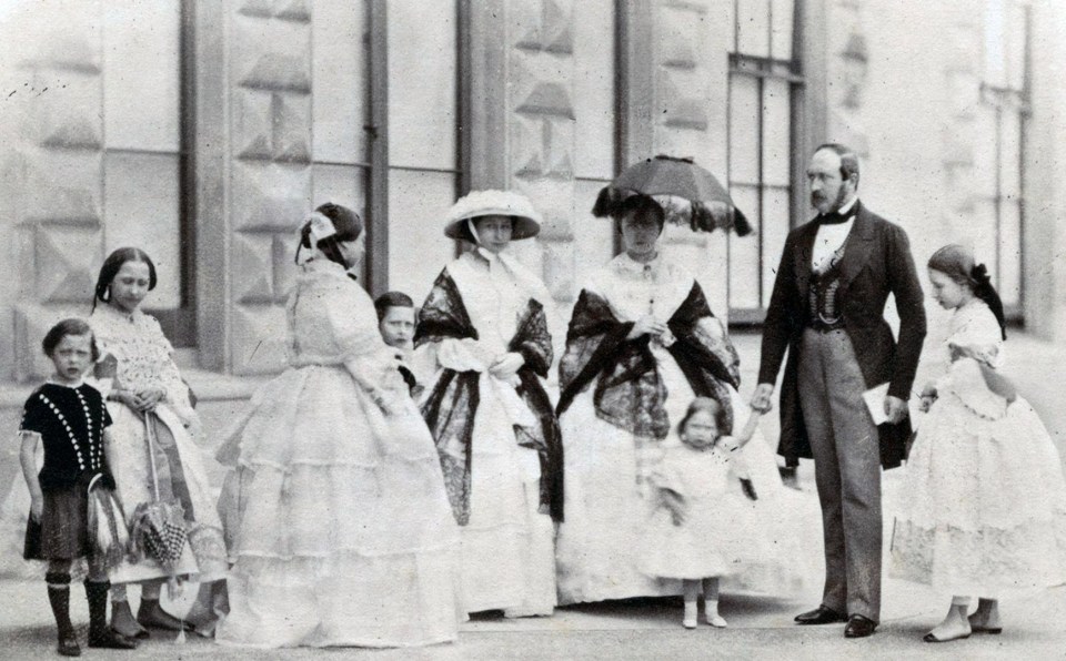 Prince Albert at Osborne House in 1850. Left to right – Prince Leopold, Princess Louise, Queen Victoria, Prince Arthur, Princess Alice, Princess Royal (Victoria), Prince Albert holding Princess Beatrice’s hand, and Princess Helena