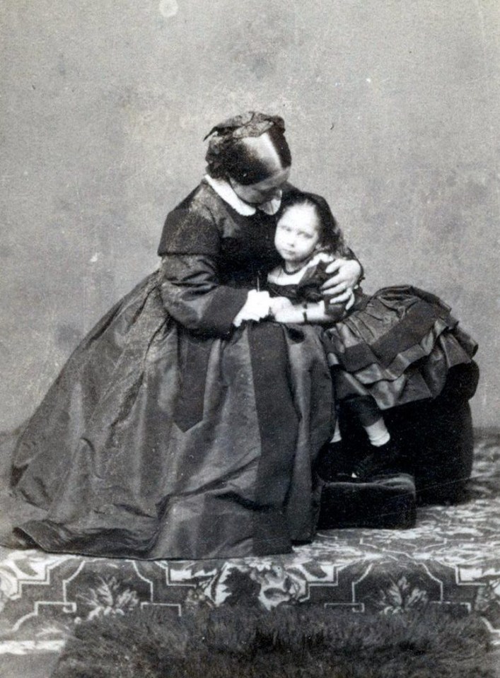 Queen Victoria and her daughter, Princess Beatrice, 1860.