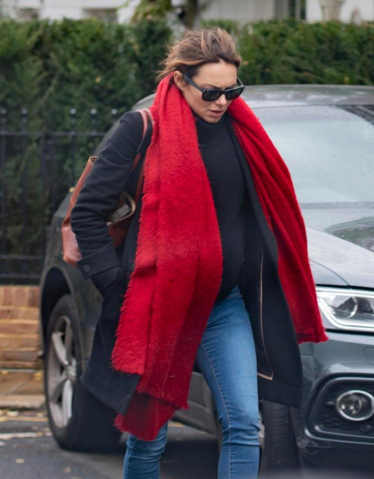  The former EastEnders actress showed off her growing bump as she ran errands