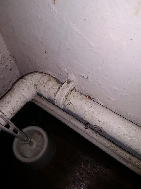  The pipes around the room appear to be grimy