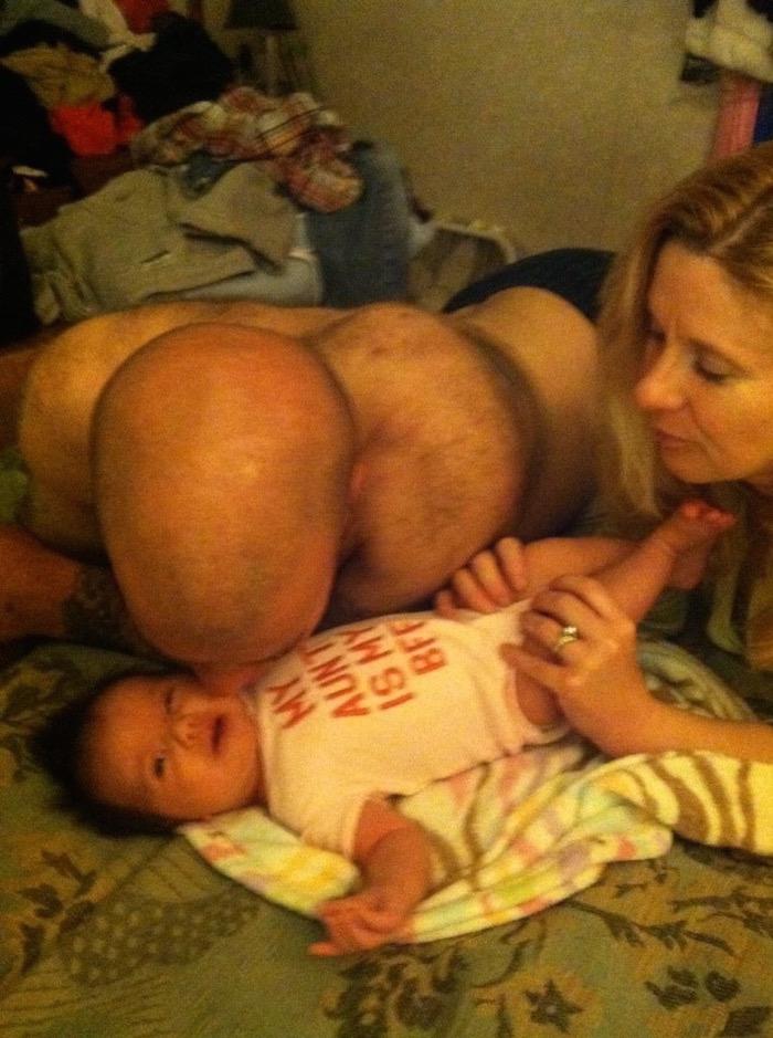 This man’s just having some fun with his newborn baby