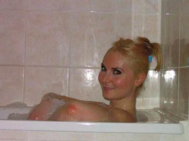 This woman posing in the bath appears to be showing off more than she intended