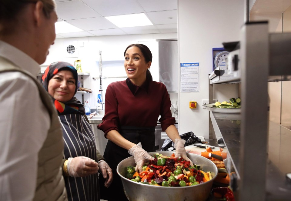 The keen chef was helping cook 200 people from the local community