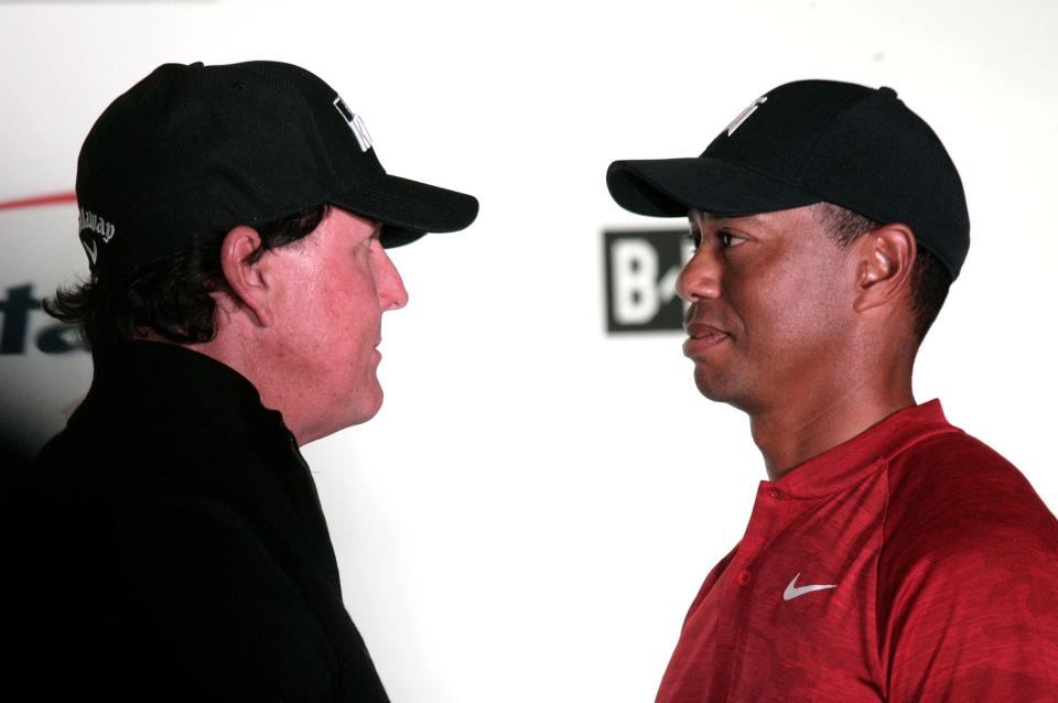  Phil Mickelson, left, and Tiger Woods have gone head-to-head in 'The Match'