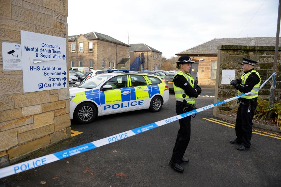  Police officers are seen outside Ailsa Hospital this morning