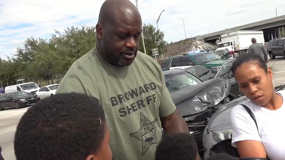  Shaq was seen helping the young family after the crash