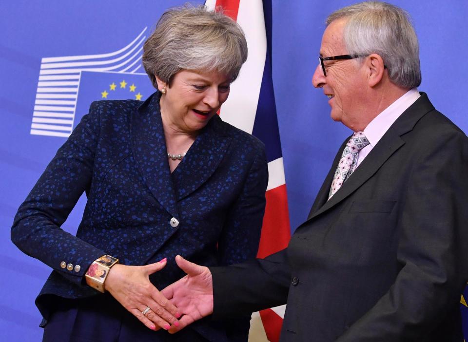  Theresa May with European Commission President Jean-Claude Juncker in Brussels before important Brexit talks