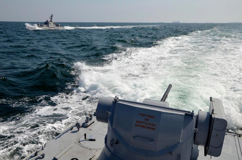  The Ukrainian Navy issued this photo after a Russian coast guard vessel rammed a Ukrainian navy tugboat near Crimea