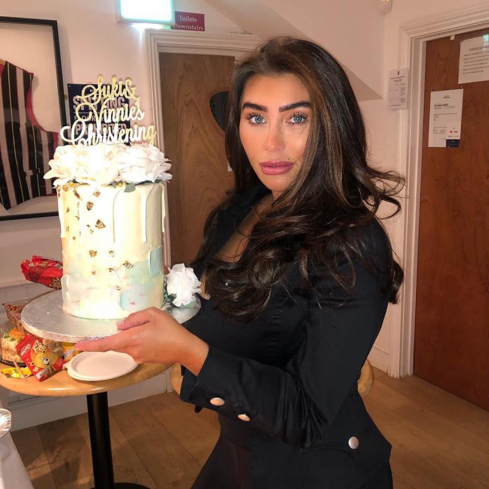  The 32-year-old proudly shared a pic of herself with the Christening cake