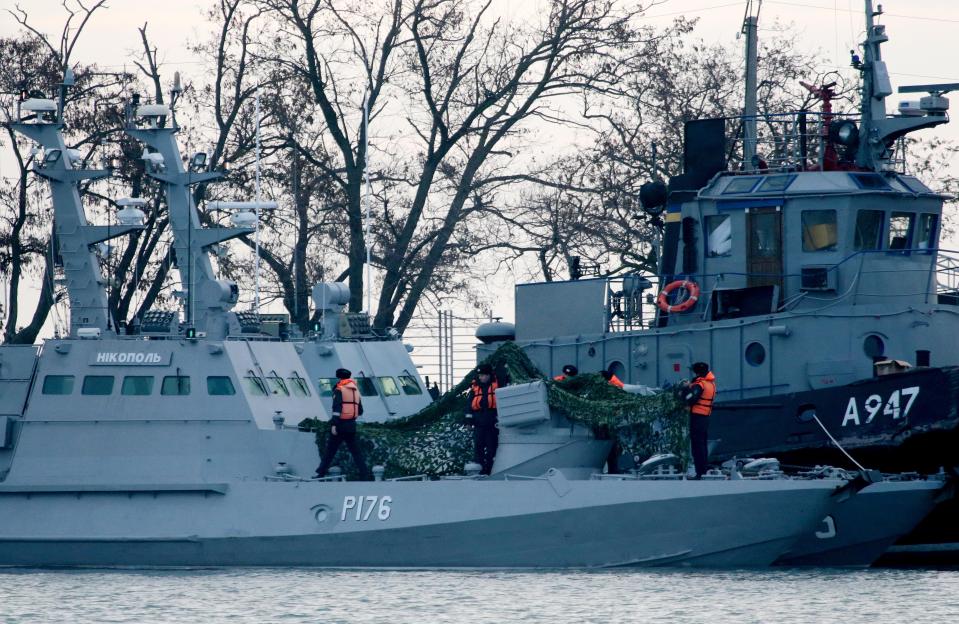  The Nikopol gunboat (L) and the Yany Kapu tugboat of the Ukrainian Navy which were tugged to Kerch Seaport