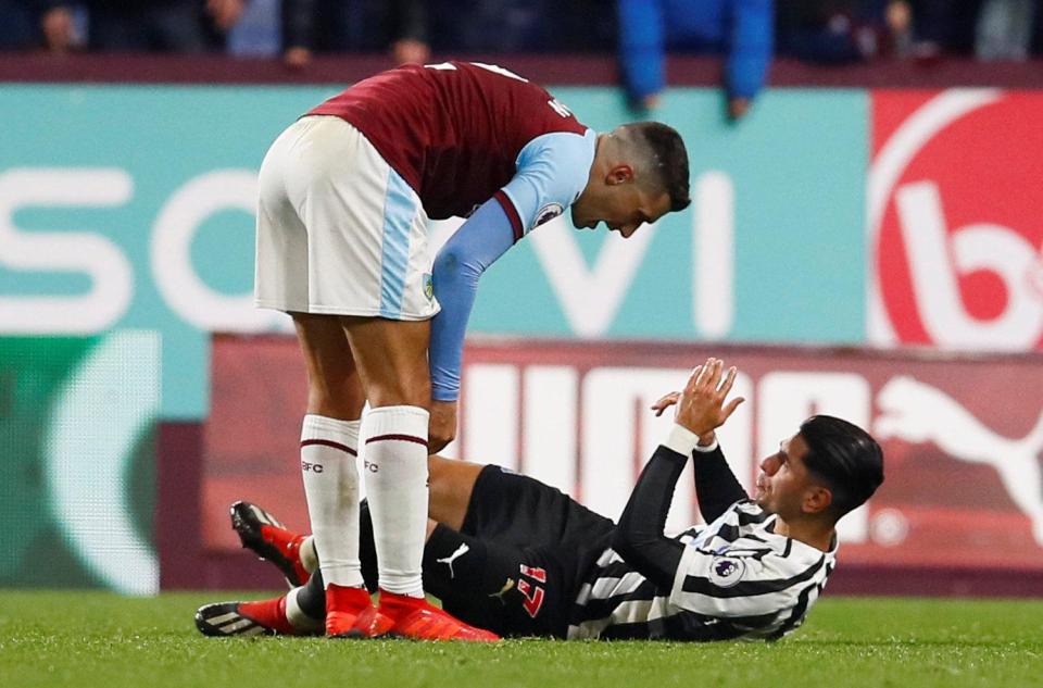  Matt Lowton clashes with Ayoze Perez after he went down far to easily claiming an elbow in the face