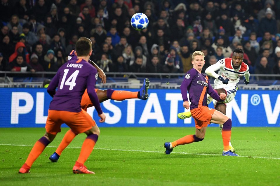  Maxwel Cornet curls in a stunning effort to give Lyon the lead