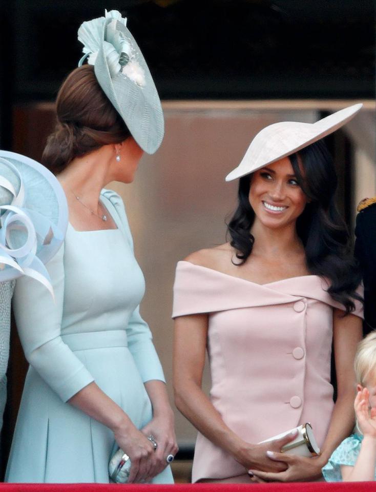  Kate took her place standing in front of Meghan at Trooping the Colour - but Meghan's smile looked strained