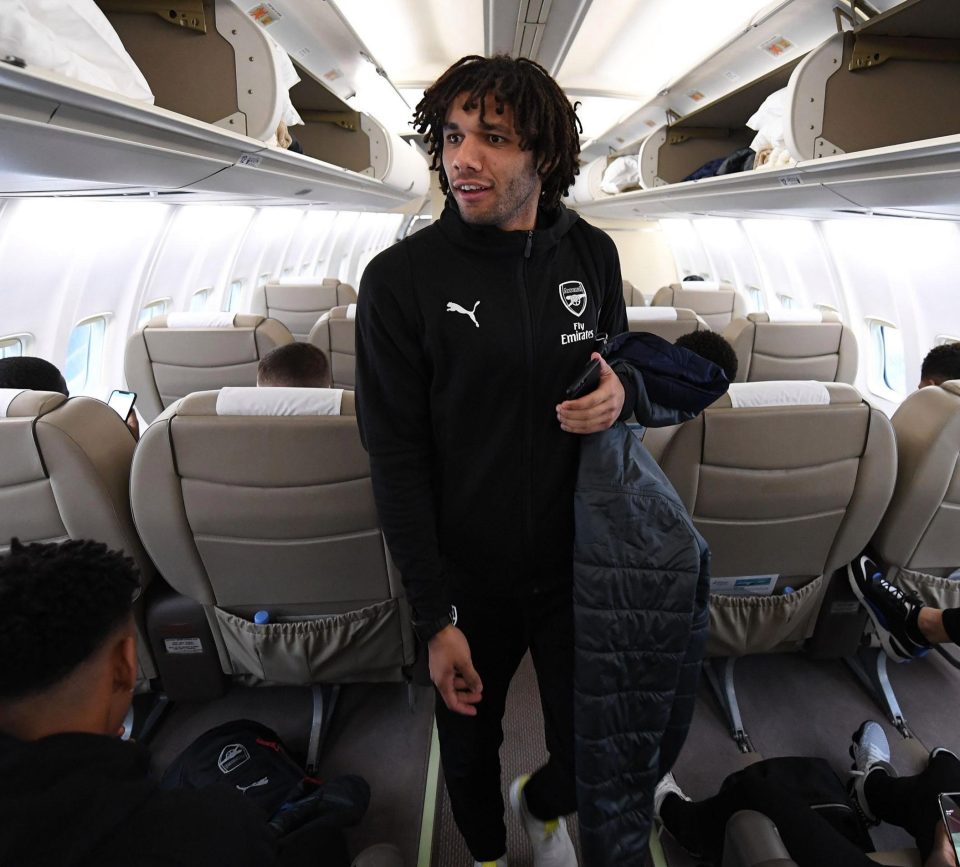  Mohamed Elneny looks for his seat on the plane but it could all be in vain