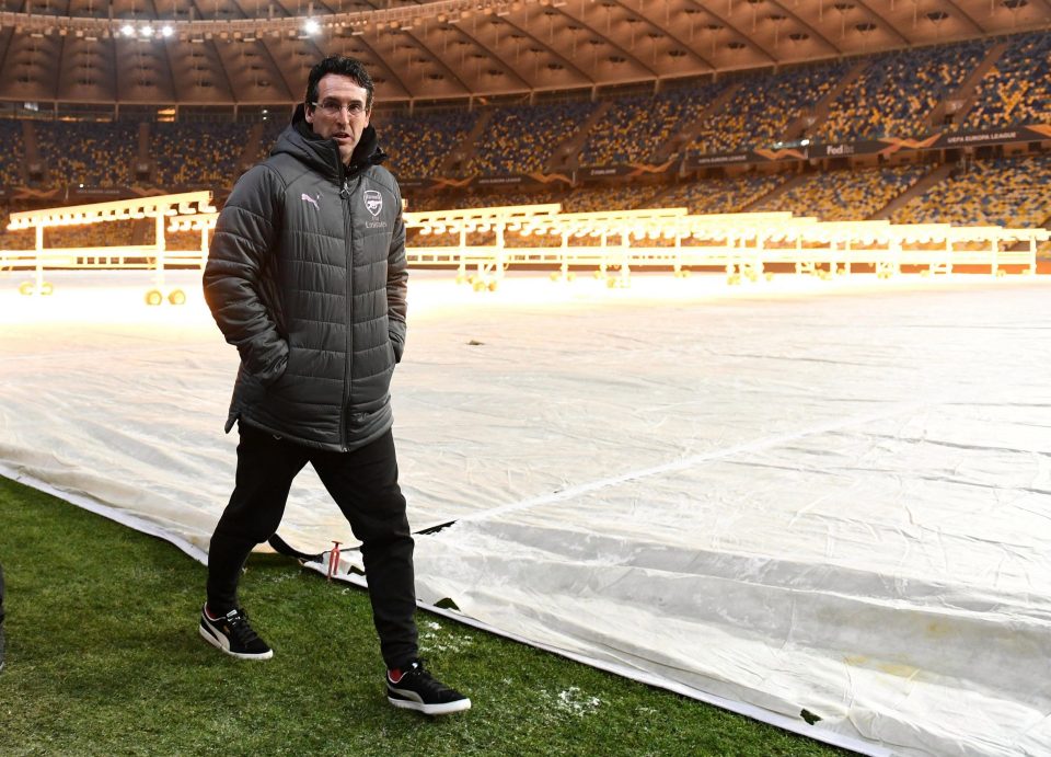  Unai Emery walks around the stadium in Kiev after Arsenal's tie was moved