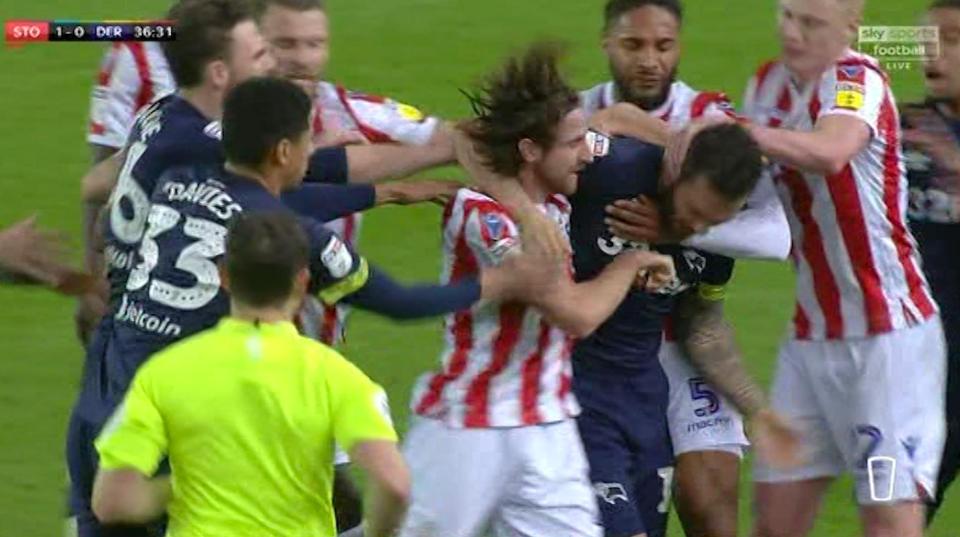  Joe Allen looked to have nudged Bradley Johnson in the back before the chaos unfolded