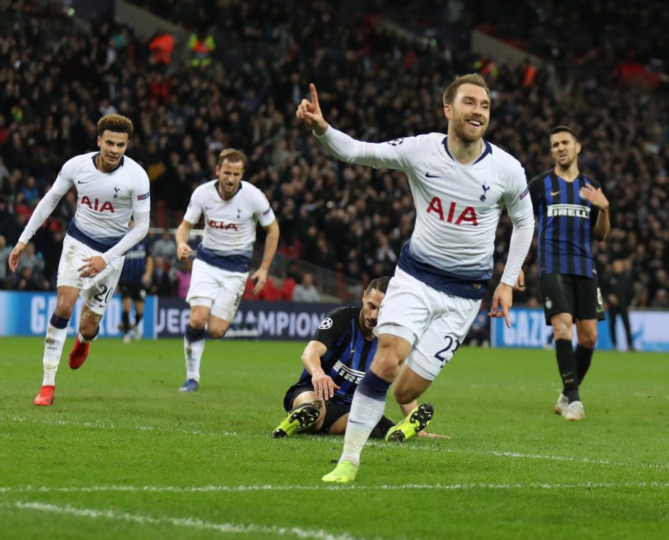  Eriksen wheels away in celebration after blasting past Samir Handanovic