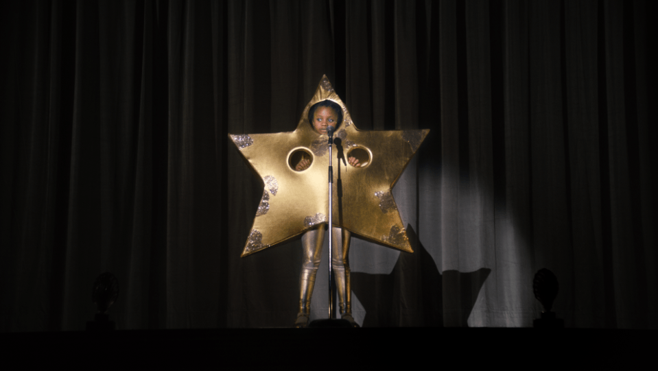  Tia takes the stage dressed as a star...but doesn't feel like one