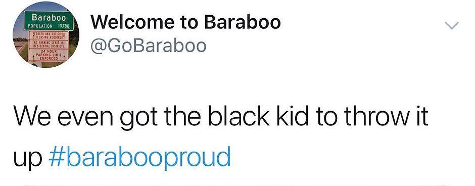 The photo was captioned with the line: ‘We even got the black kid to throw it up #barabooproud’