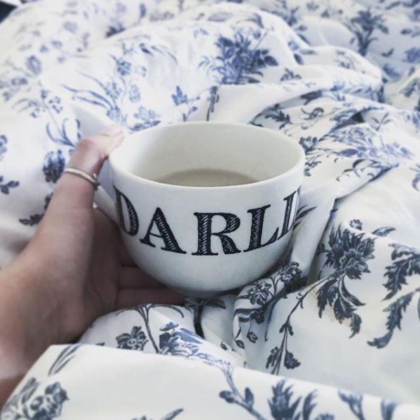  The star has tasteful, floral sheets on her double bed