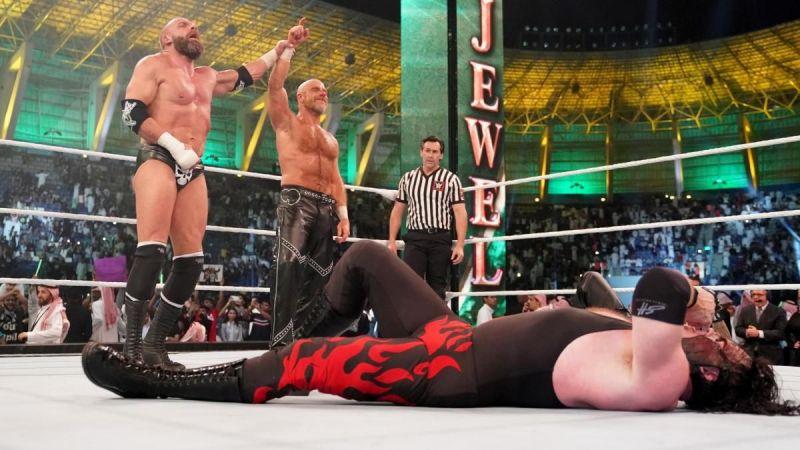  Triple H bravely battled on to secure victory for him and Shawn Michaels over The Undertaker and Kane