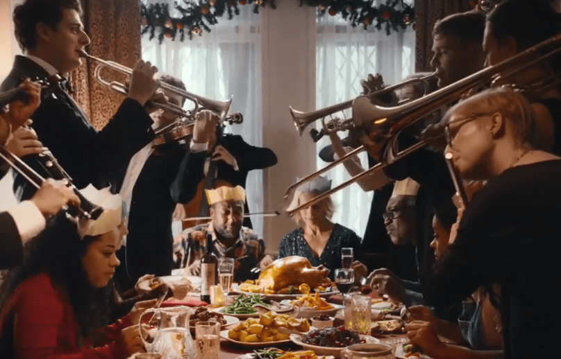  The camera then zooms out and shows that the woman has foolishly ordered a 16-piece orchestra for her Christmas dinner