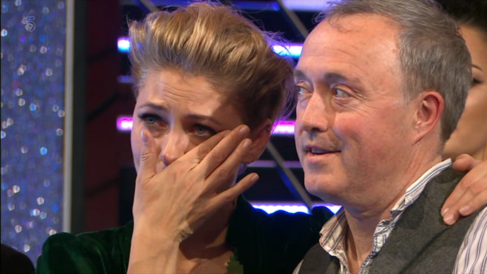  Emma was visibly emotional as she hugged the show's narrator, Marcus