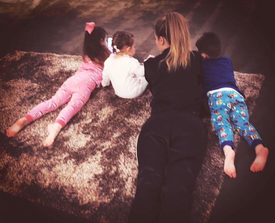  Christine, here with four-year-old's Penelope and Lep, and their two-year-old daughter Felicity, previously explained how Christmas decorations left the twins 'anxious'