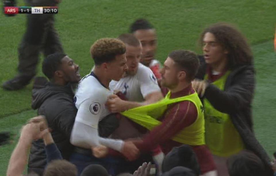  Dele Alli and Aaron Ramsey had to be separated by team-mates