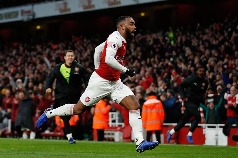  Lichtsteiner can be seen running towards Lacazette after the Frenchman made it 3-2