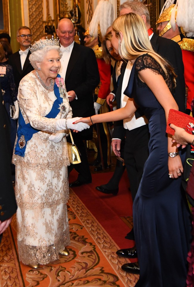 The Queen shakes the ambassador of Norway's hand