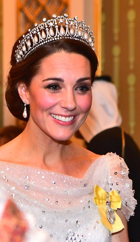 Kate beams while wearing the Cambridge Lover's Knot Tiara