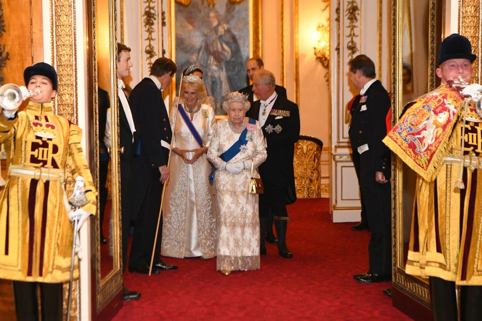 The Queen enters the lavish affair in front of the Duke and Duchess of Cornwall and the Duke and Duchess of Cambridge