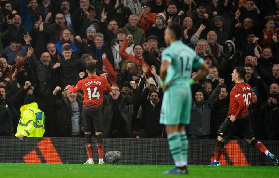  Jesse Lingard celebrates his equaliser against Arsenal in front of the fans at Old Trafford