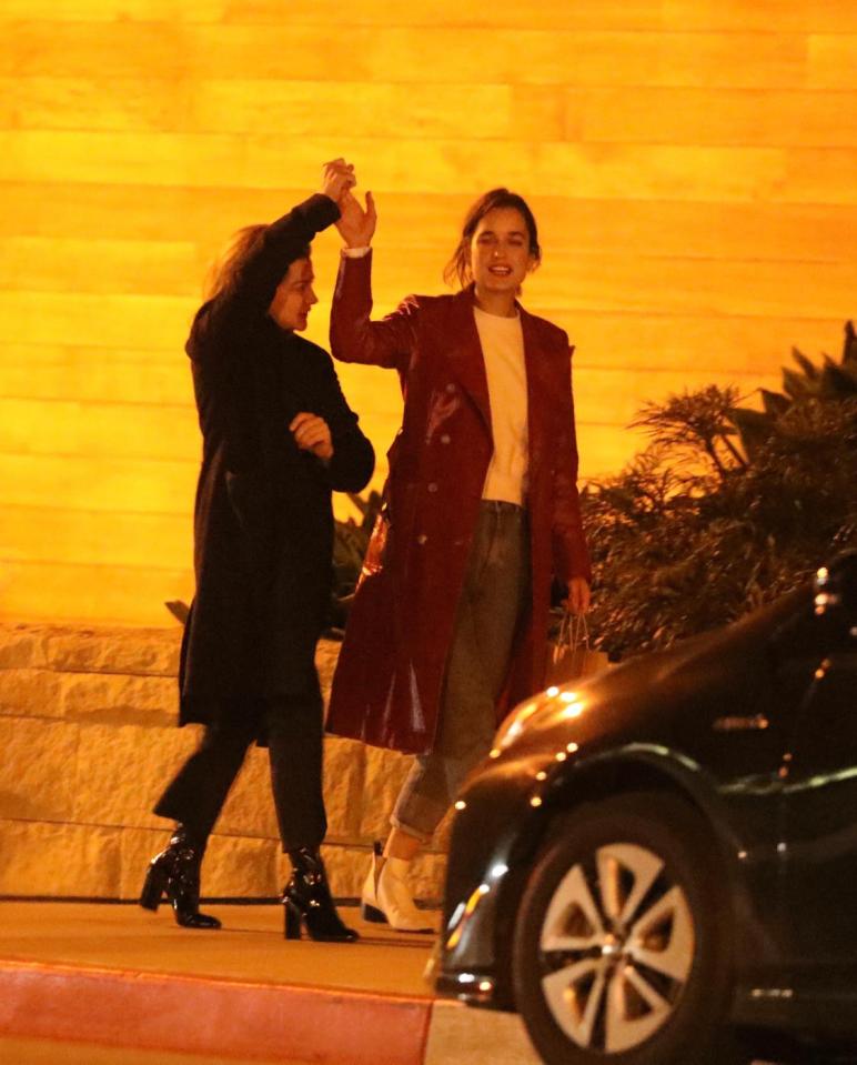  Chloe and Kate held hands as they walked along together after their date