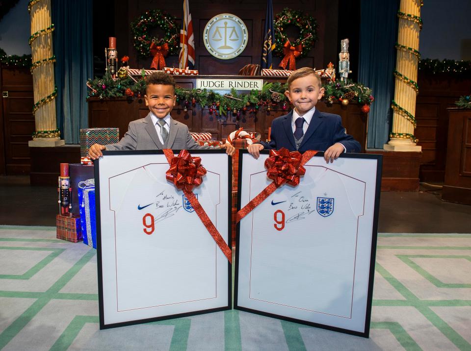  Harris and Owen both leave Judge Rinder's courtroom with England shirts signed by striker Harry Kane