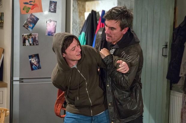  Matty Barton will be left for dead by ex-boyfriend Isaac after a sickening attack at New Year’s party - Matty is seen here with his step-dad Cain Dingle