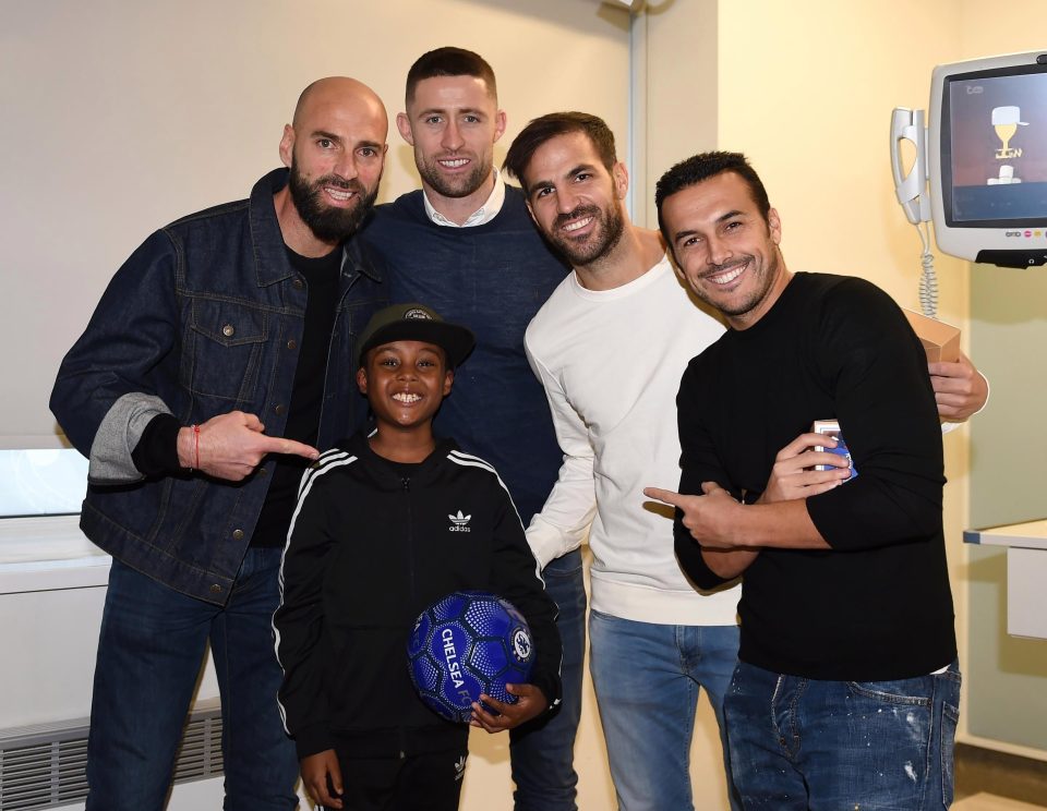  Children at the Chelsea and Westminster Hospital were handed club merchandise by the players