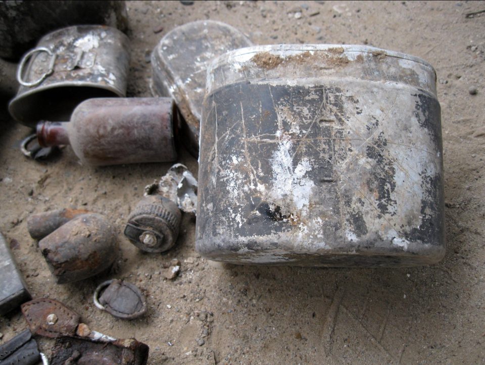  Personal items such as water bottles, tags and IDs were found among the corpses