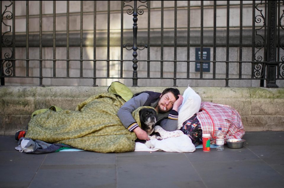  A homeless man sleeping on the street in central London