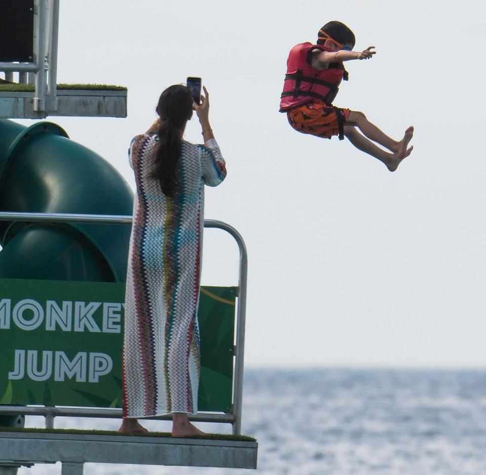  Lauren filmed Eric as he hurtled, feet first, into the sea in Barbados