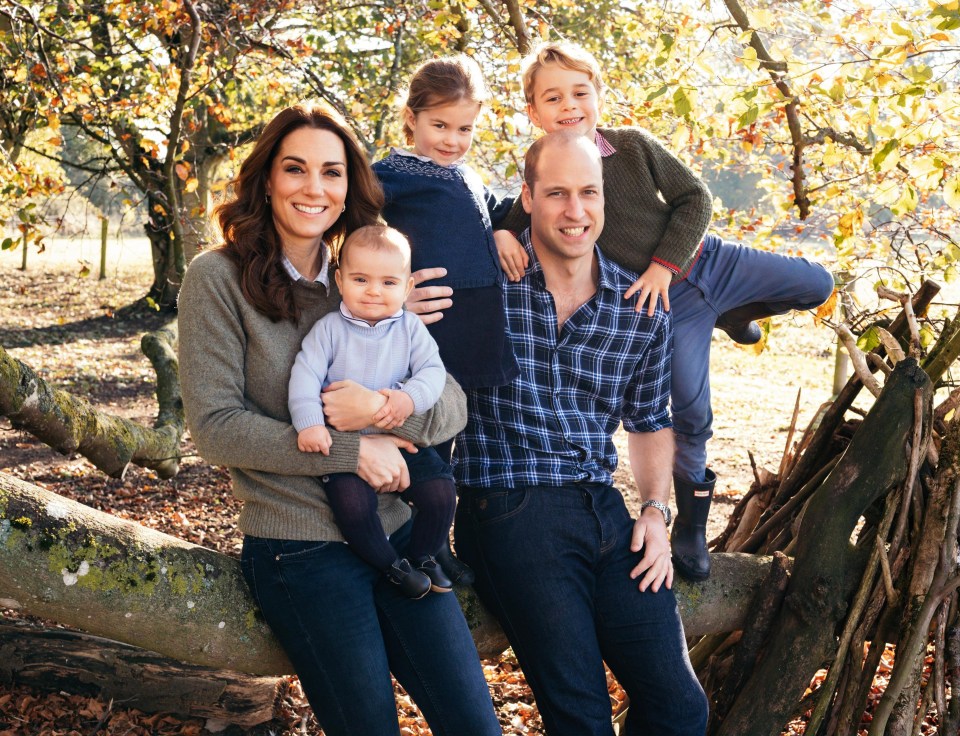  The Duke and Duchess of Cambridge in their festive photo last year with Prince George, Princess Charlotte and Prince Louis 