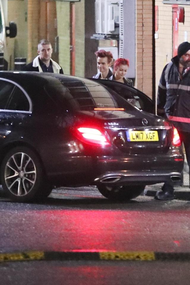  They were seen waiting for a car as they left the wrap party