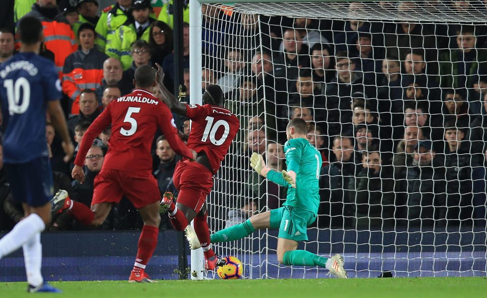  Sadio Mane steers in the volleyed opener for Liverpool after chesting the ball down