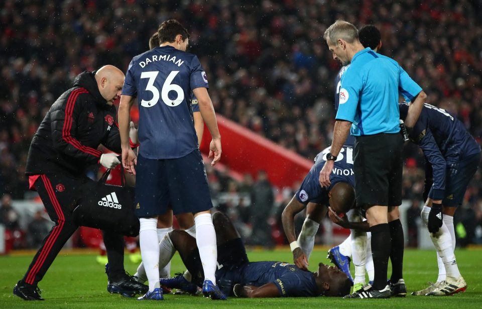  Man Utd defender Eric Bailly gets treatment on an afternoon when his side were on the backfoot