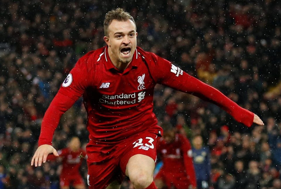  Xherdan Shaqiri does not hold back as he celebrates putting Liverpool back in front on his way to a double that clinched a well-deserved 3-1 triumph over Man Utd