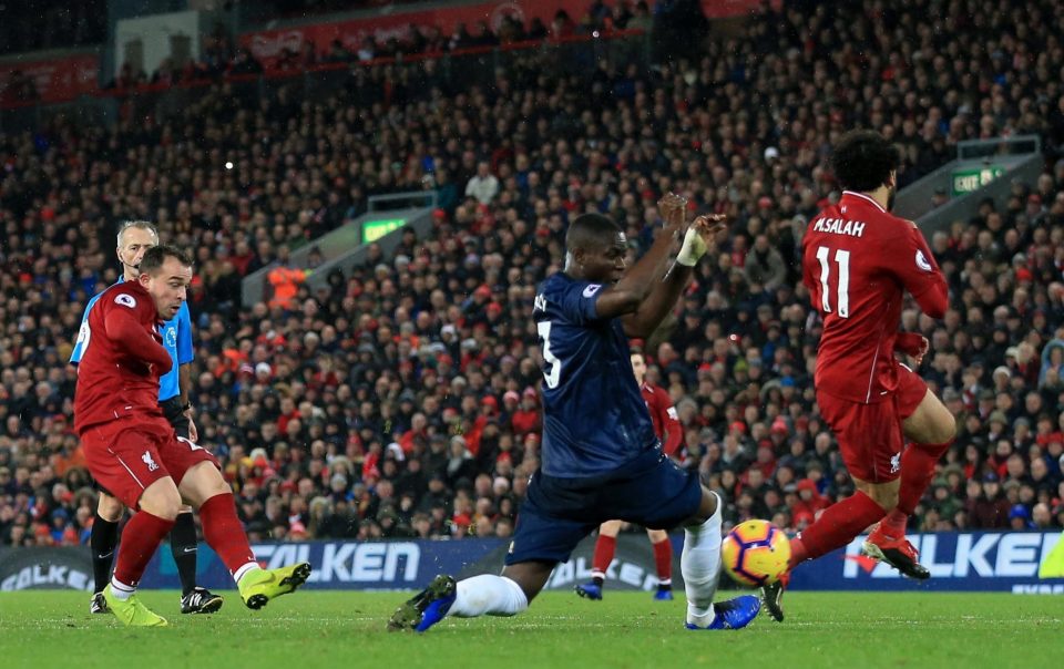  Xherdan Shaqiri rifles his second and Liverpool's third goal - wrong-footing United keeper David De Gea