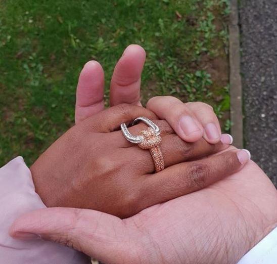  One picture sees Nadiya's hand in Abdal's as she rocks a massive ring across her engagement and middle fingers