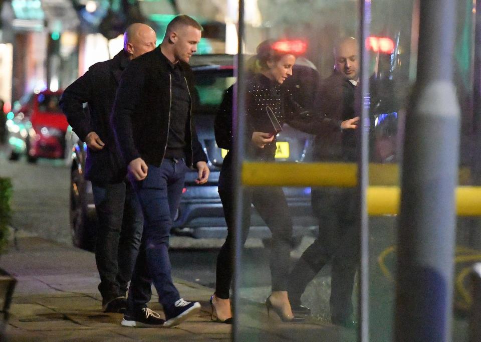  The couple entering the Victors restaurant