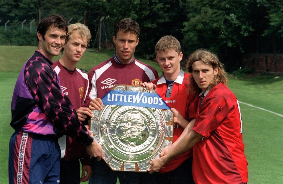  The five new recruits pose with the Community Shield but it was Solskjaer who won it again in 2003